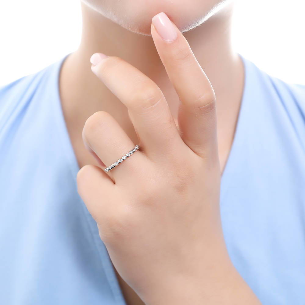 Model wearing Solitaire 1ct Emerald Cut CZ Ring Set in Sterling Silver