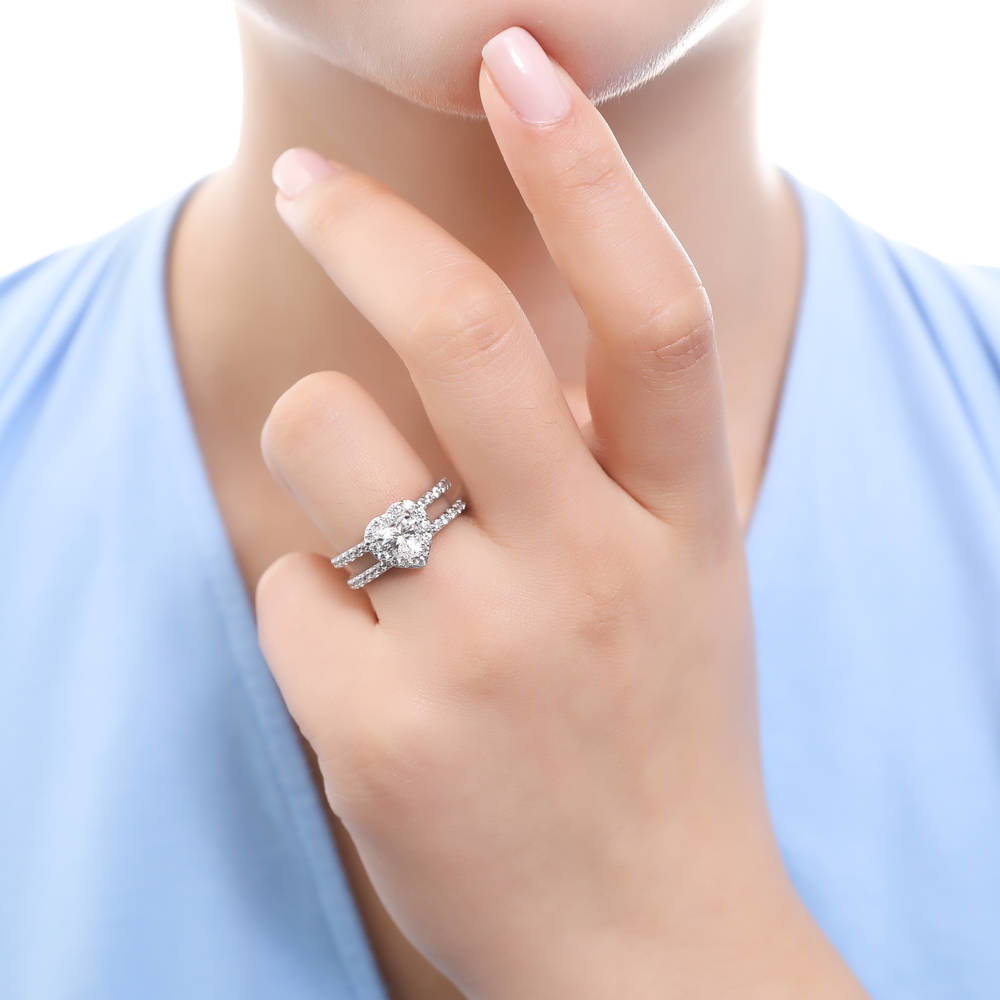 Model wearing Halo Heart CZ Ring in Sterling Silver