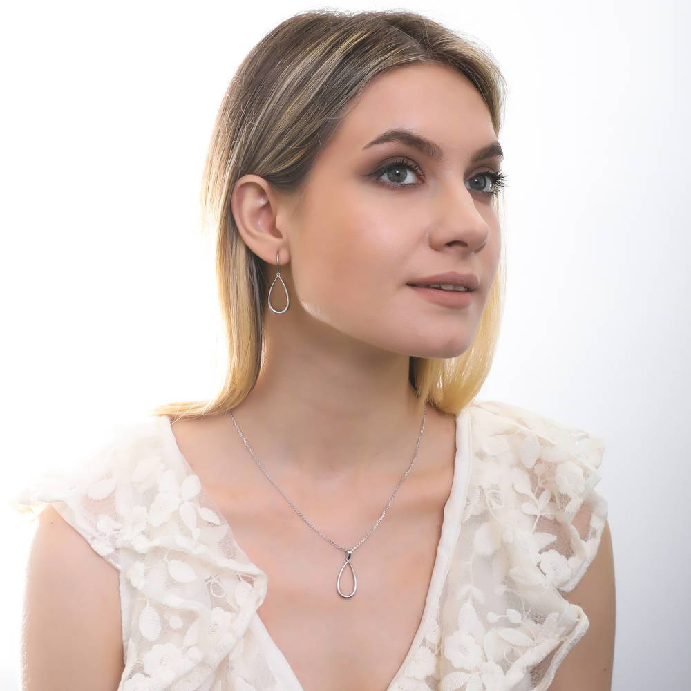 Model wearing Teardrop Necklace and Earrings Set in Sterling Silver, 2 of 11