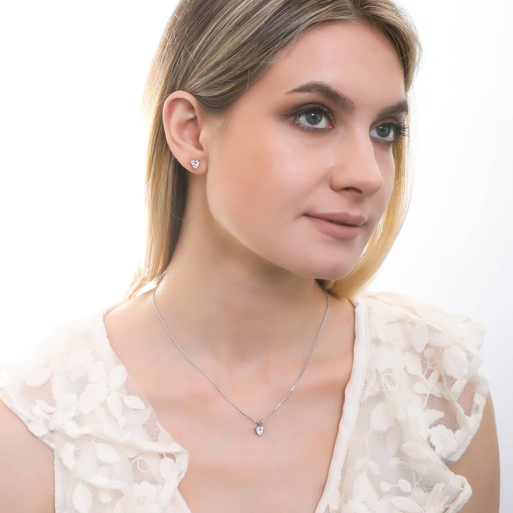 Model wearing Solitaire 0.7ct Heart CZ Necklace in Sterling Silver, 5 of 7