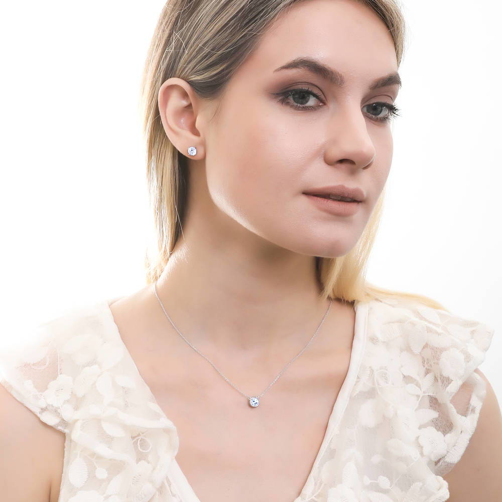Model wearing Solitaire Round CZ Stud Earrings in Sterling Silver 1.6ct, 10 of 13