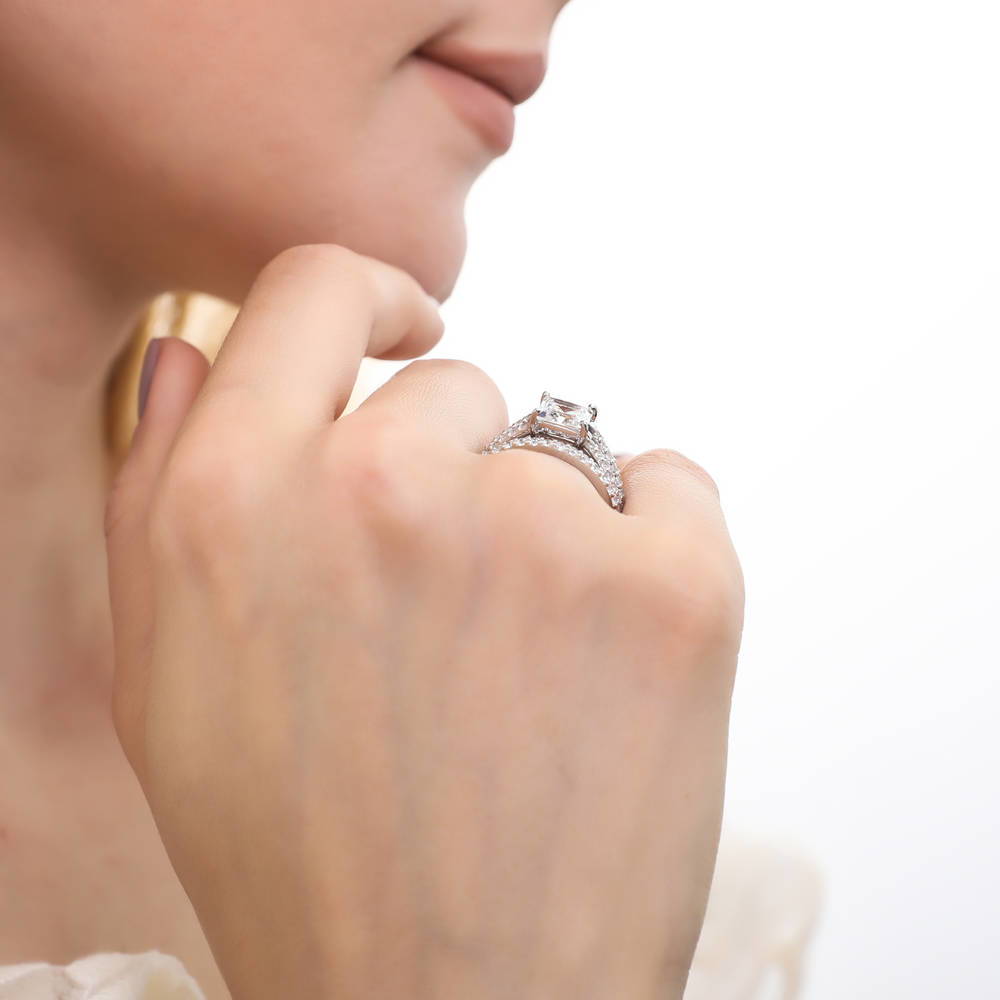 Model wearing Solitaire 2ct Princess CZ Split Shank Ring Set in Sterling Silver, 9 of 15