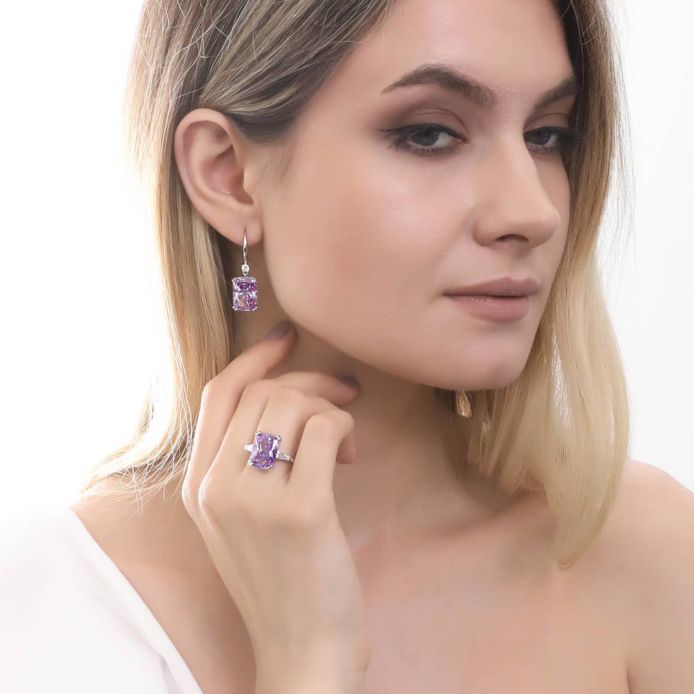 Model wearing Solitaire Purple Radiant CZ Leverback Earrings in Sterling Silver, 5 of 6