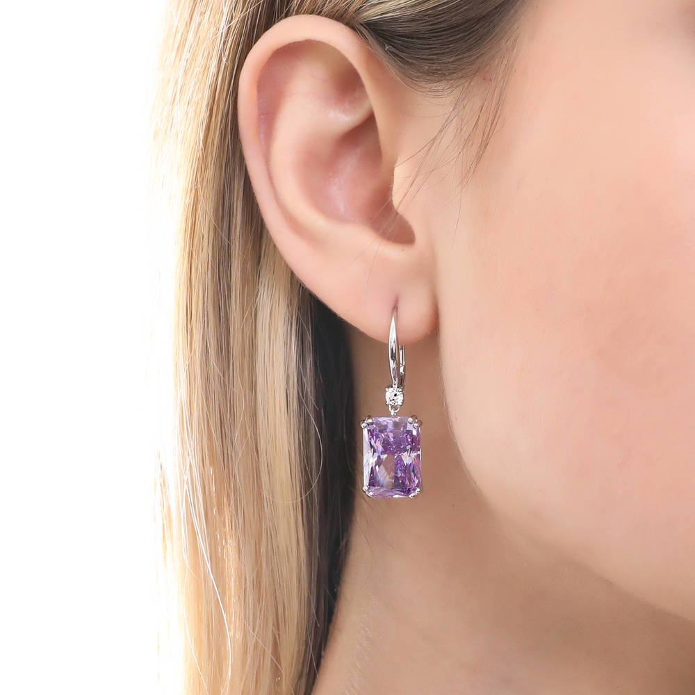 Model wearing Solitaire Purple Radiant CZ Leverback Earrings in Sterling Silver, 2 of 6