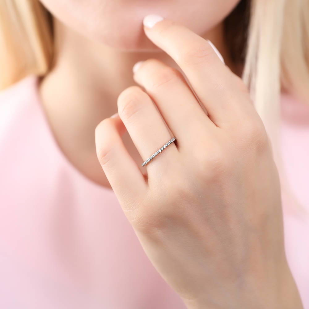 Model wearing Pave CZ Eternity Ring in Sterling Silver, 2 of 6