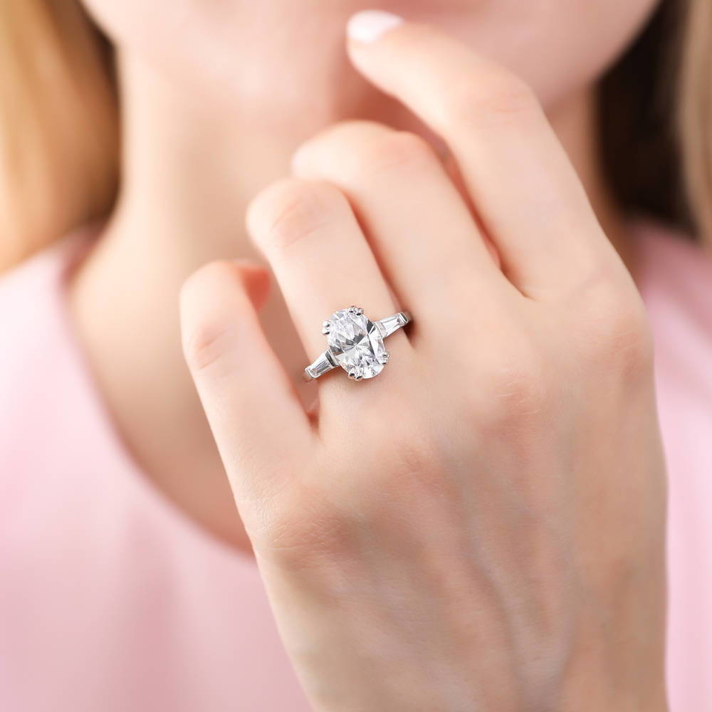 Model wearing 3-Stone Oval CZ Ring in Sterling Silver, 5 of 10