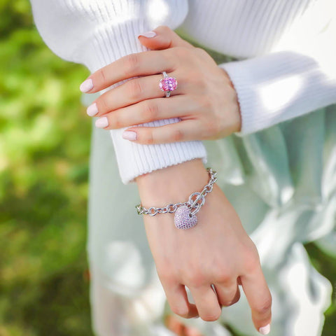 Image Contain: Model Wearing 3-Stone Ring, Heart Charm Bracelet