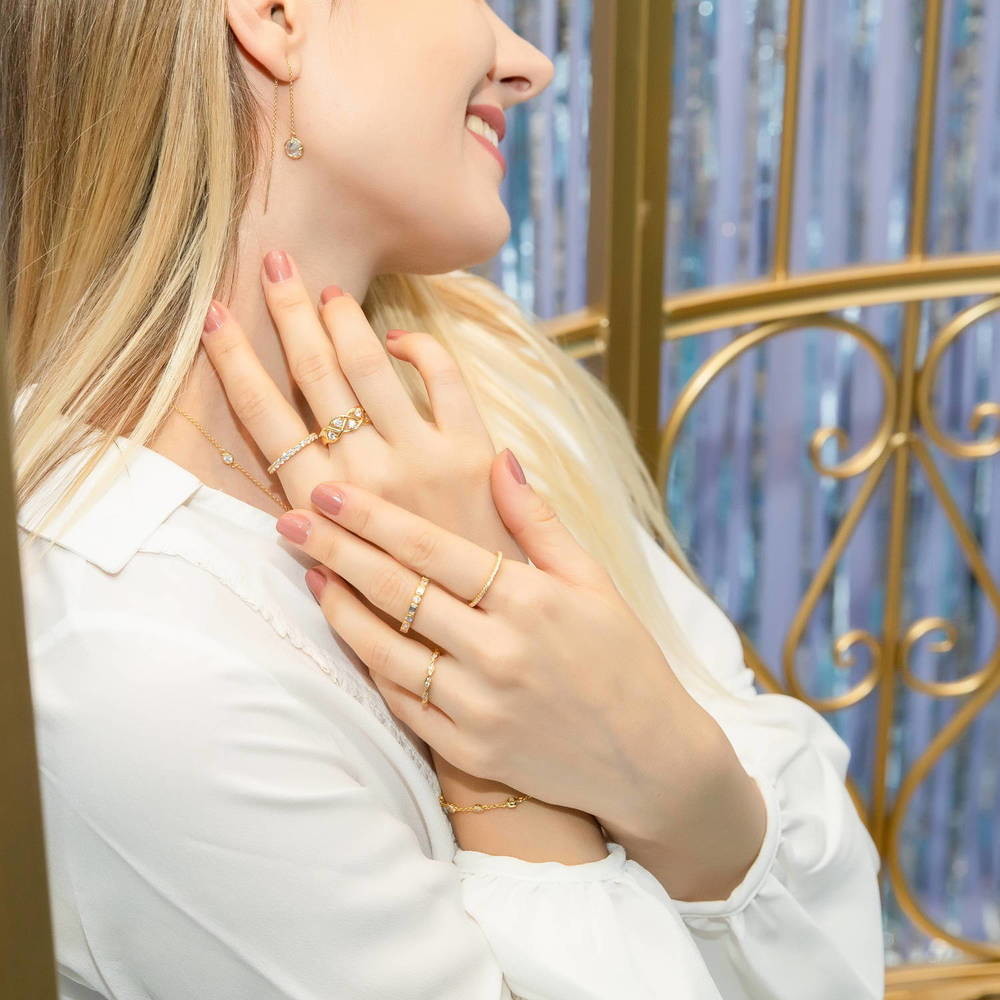 Model wearing Pave CZ Eternity Ring in Gold Flashed Sterling Silver, 7 of 11