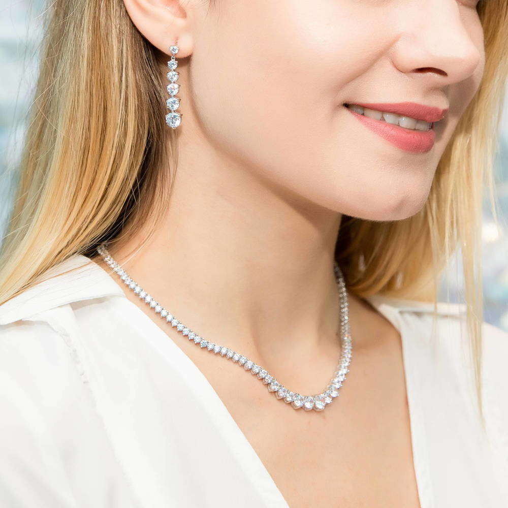 Model wearing Graduated CZ Necklace and Earrings in Sterling Silver, 2 of 17