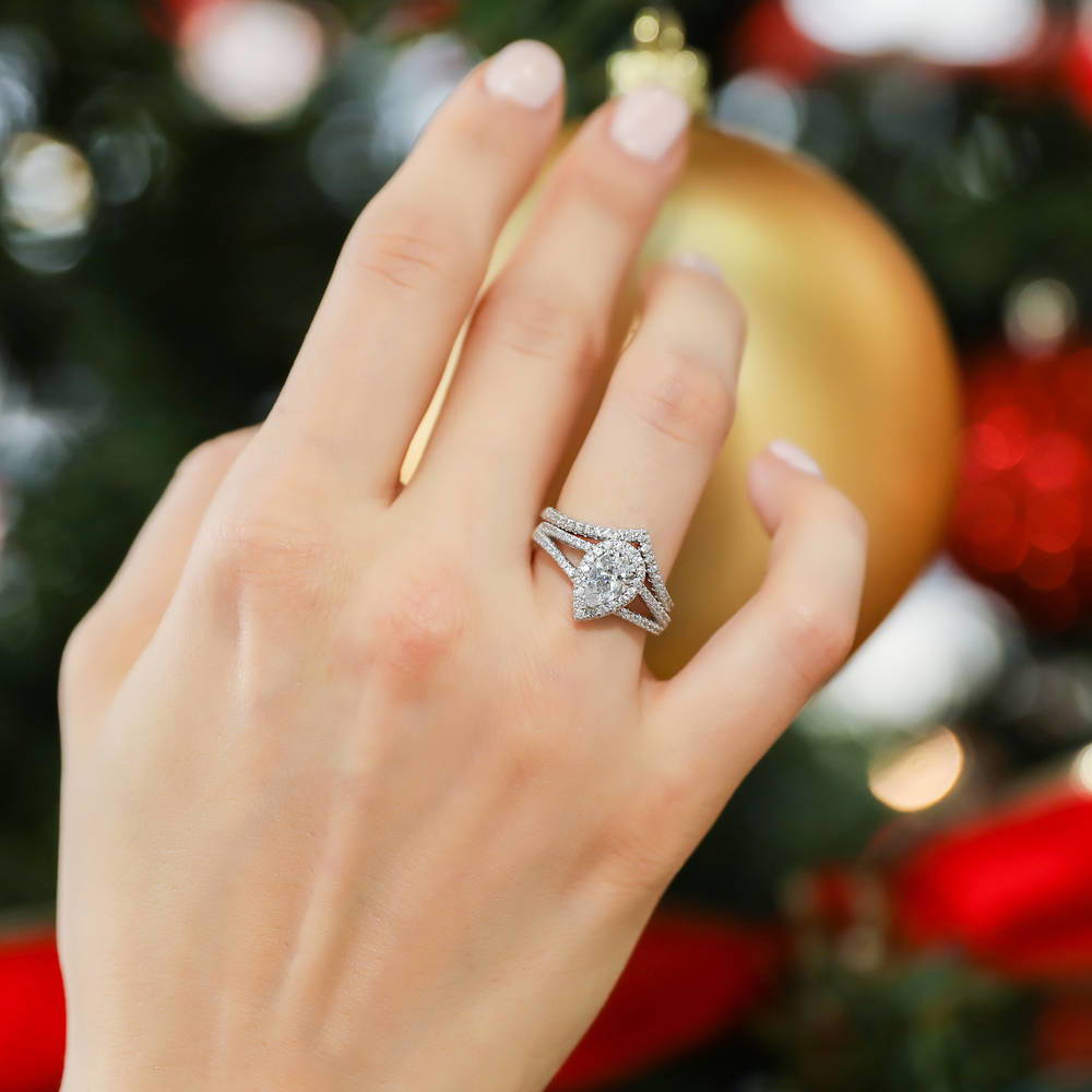 Model wearing Halo Wishbone Pear CZ Split Shank Ring Set in Sterling Silver, 7 of 18