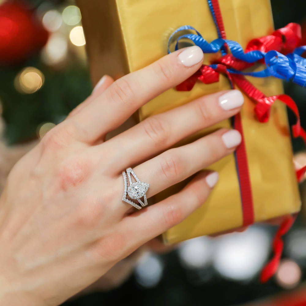 Model wearing Halo Pear CZ Split Shank Ring Set in Sterling Silver, 5 of 17