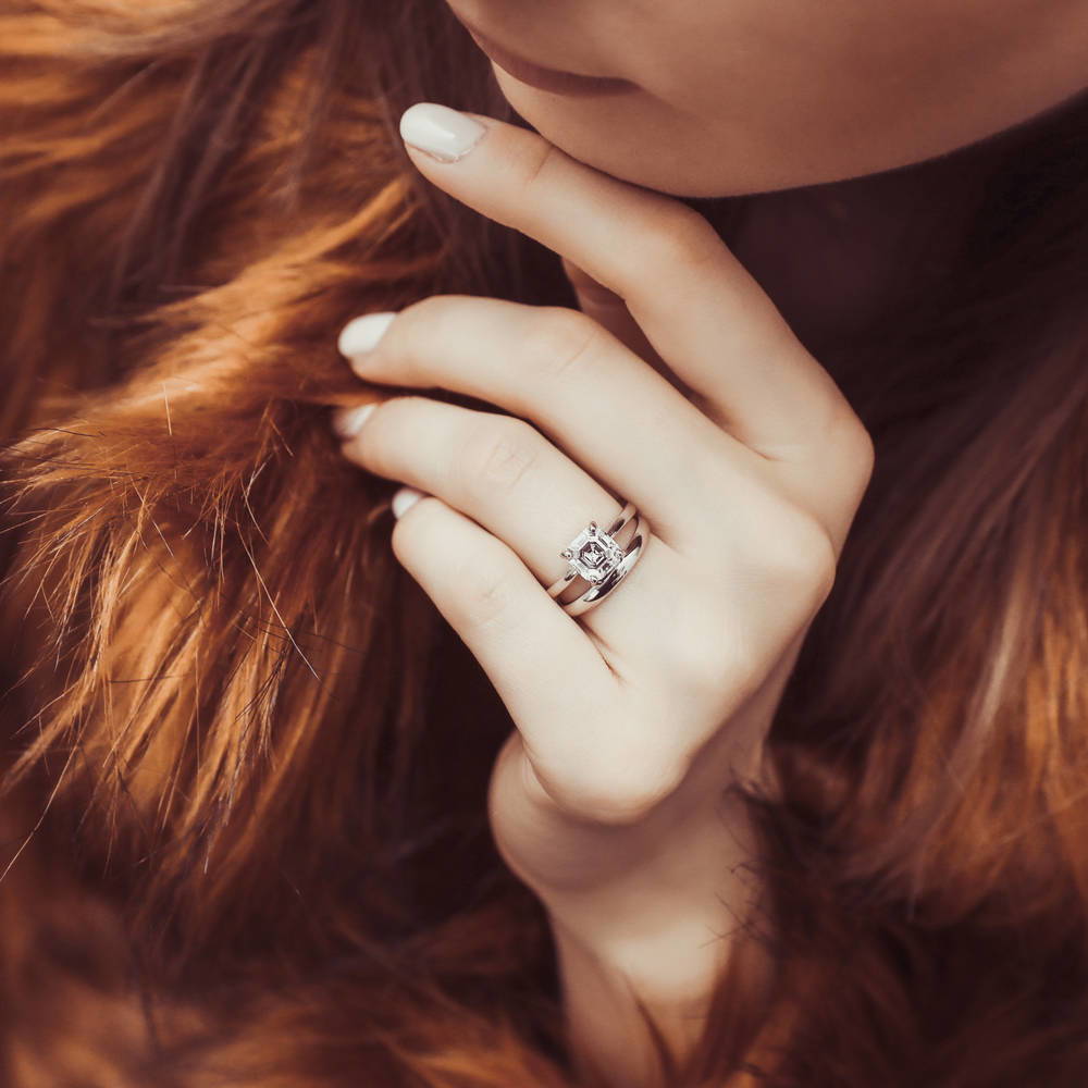 Model wearing Solitaire 2ct Asscher CZ Ring Set in Sterling Silver, 2 of 9