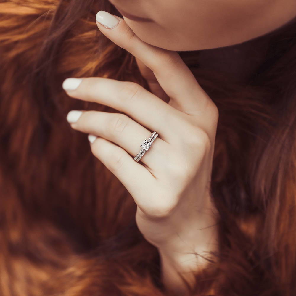 Model wearing Solitaire 0.6ct Cushion CZ Ring Set in Sterling Silver, 2 of 11