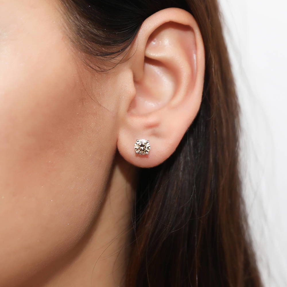 Model wearing Solitaire Round CZ Stud Earrings in Sterling Silver 1.6ct, 8 of 13