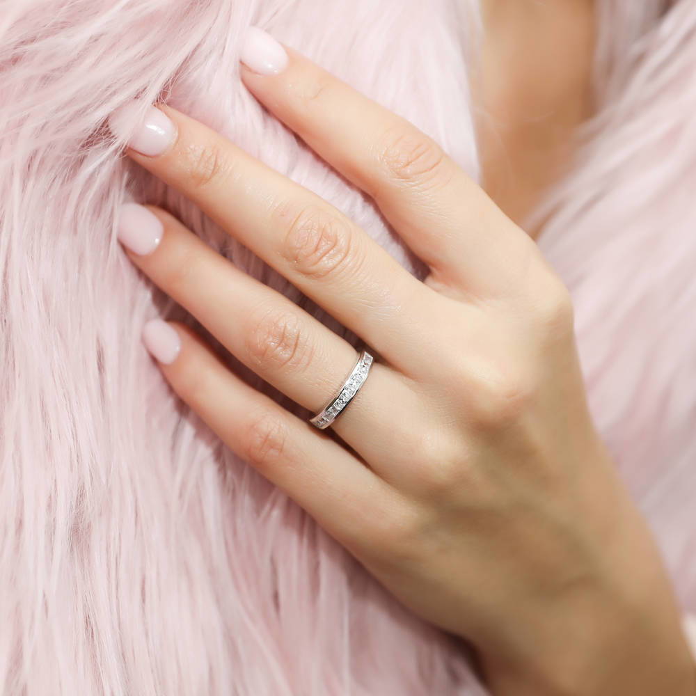 Model wearing Channel Princess CZ Eternity Ring in Sterling Silver, 2 of 8