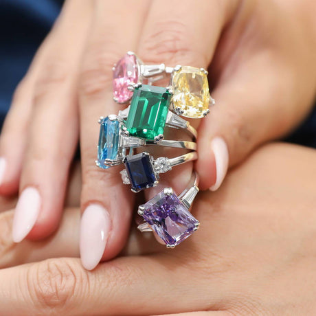Image Contain: Model Wearing 3-Stone Ring, Solitaire with Side Stones Ring