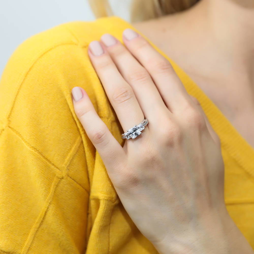 Model wearing 3-Stone Princess CZ Ring in Sterling Silver, 2 of 17