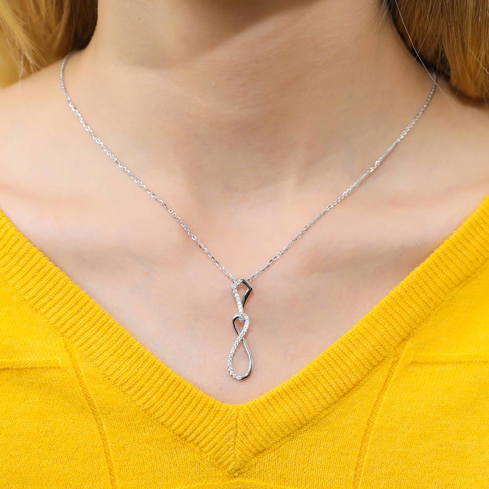 Model wearing Infinity CZ Pendant Necklace in Sterling Silver, 2 of 6