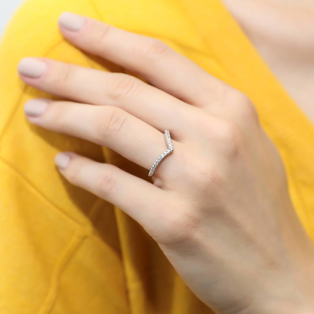 Model wearing Wishbone CZ Eternity Ring in Sterling Silver, 2 of 9