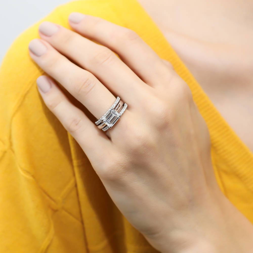 Model wearing East-West Solitaire CZ Ring Set in Sterling Silver, 2 of 16