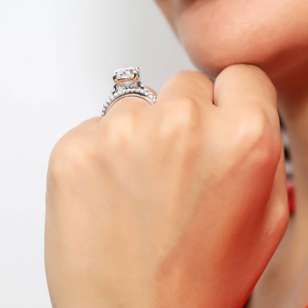 Model wearing Solitaire 5.5ct Oval CZ Ring Set in Sterling Silver, 2 of 15