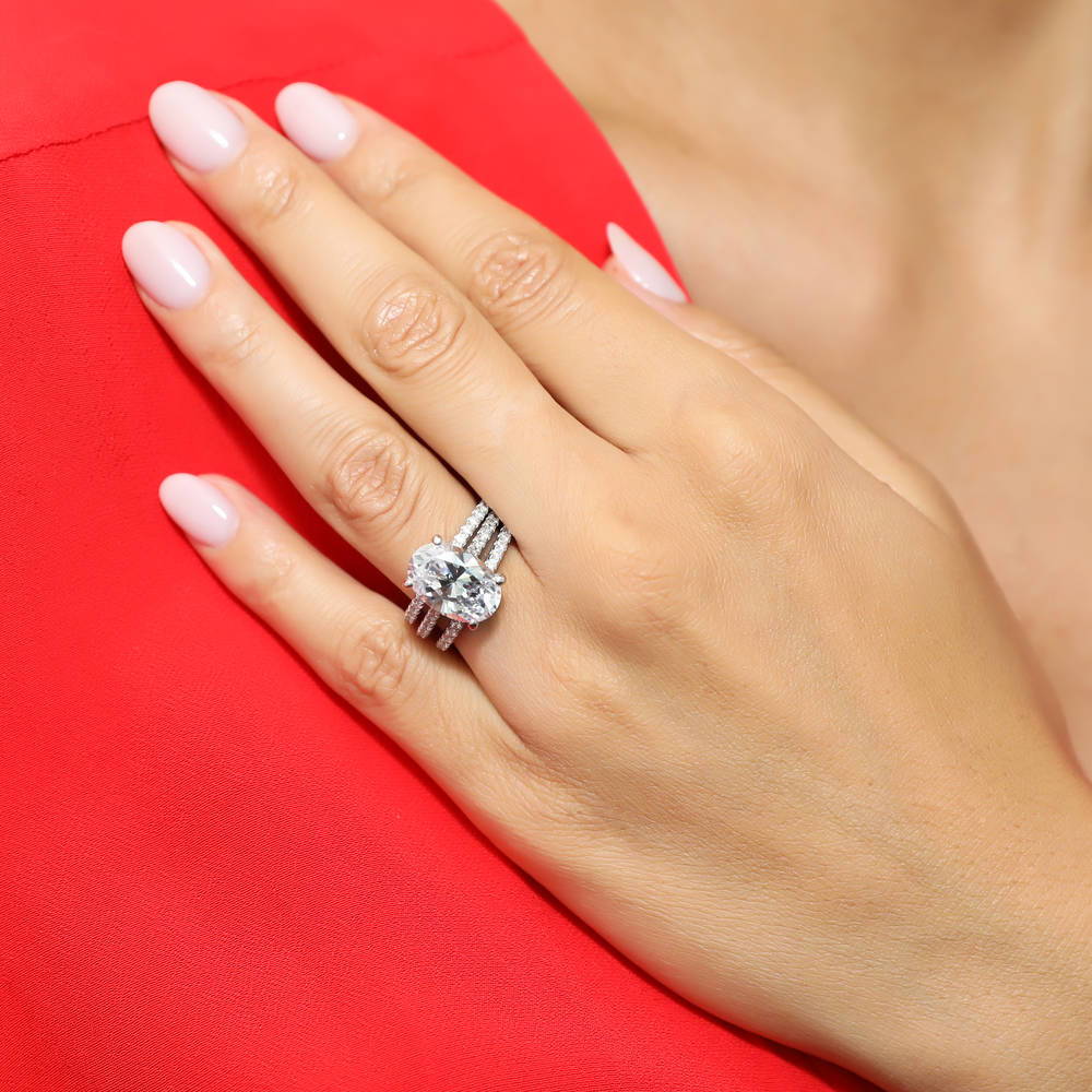 Model wearing Solitaire 5.5ct Oval CZ Ring Set in Sterling Silver, 6 of 14