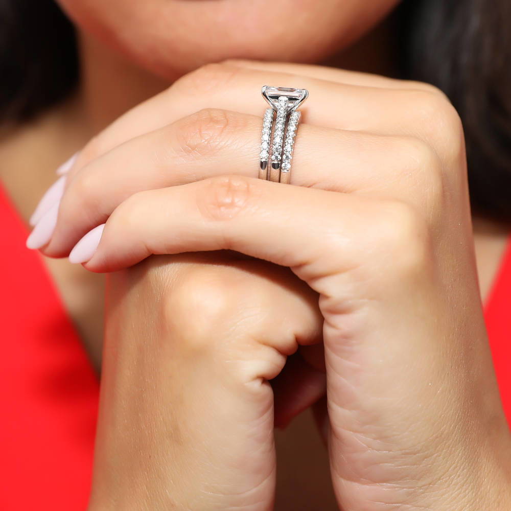 Model wearing Solitaire 2.6ct Emerald Cut CZ Ring Set in Sterling Silver, 2 of 11