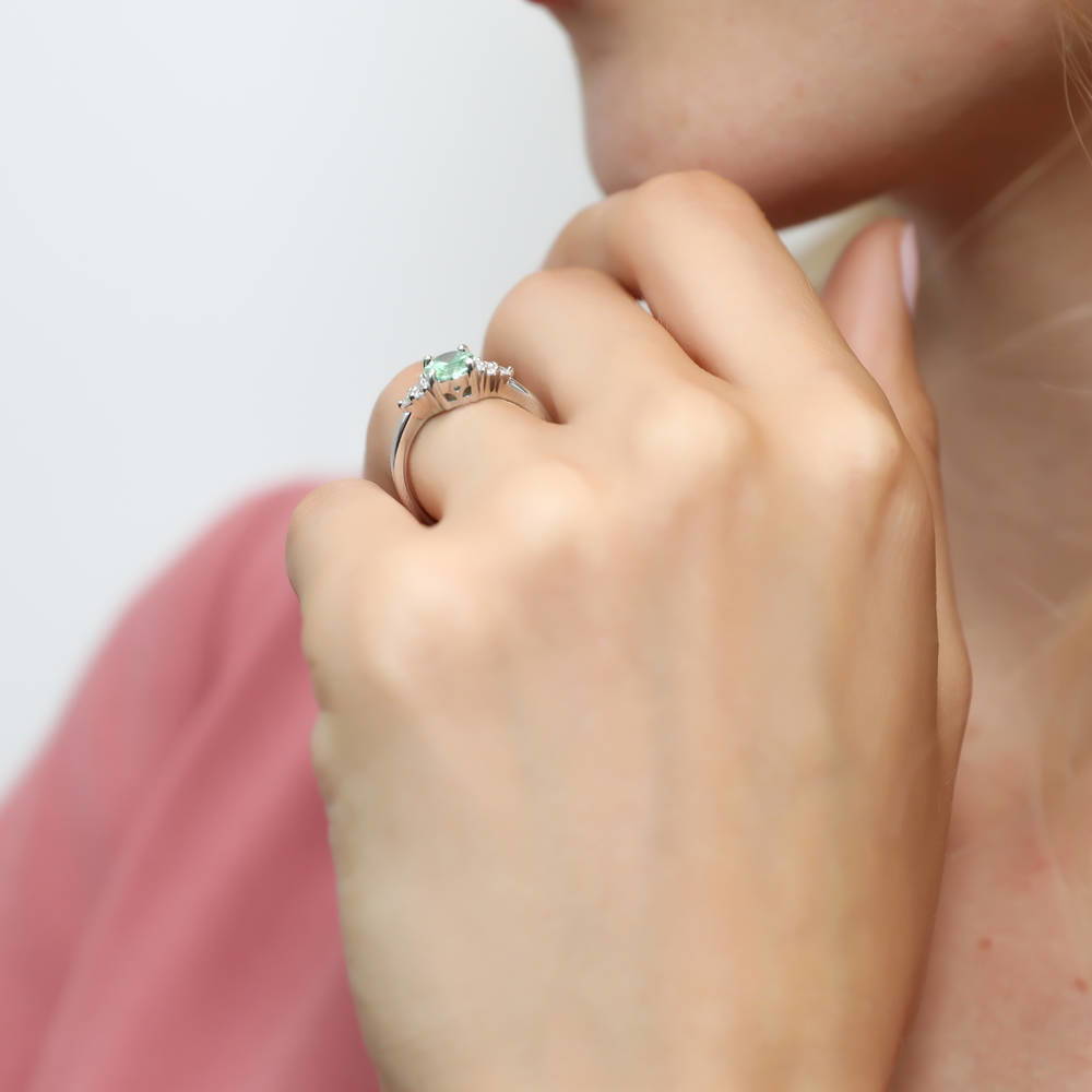 Model wearing Solitaire Green Oval CZ Ring in Sterling Silver 1.2ct, 3 of 8