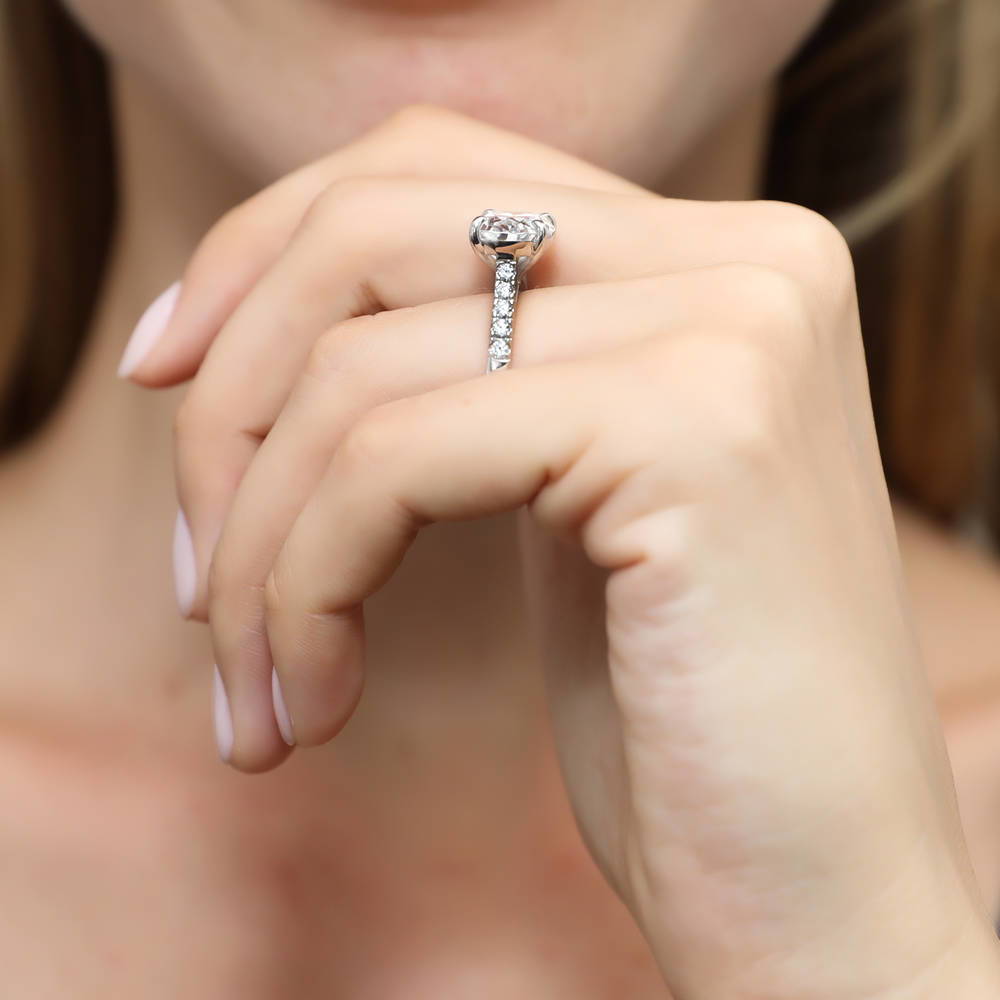 Model wearing East-West Solitaire CZ Ring Set in Sterling Silver, 11 of 13