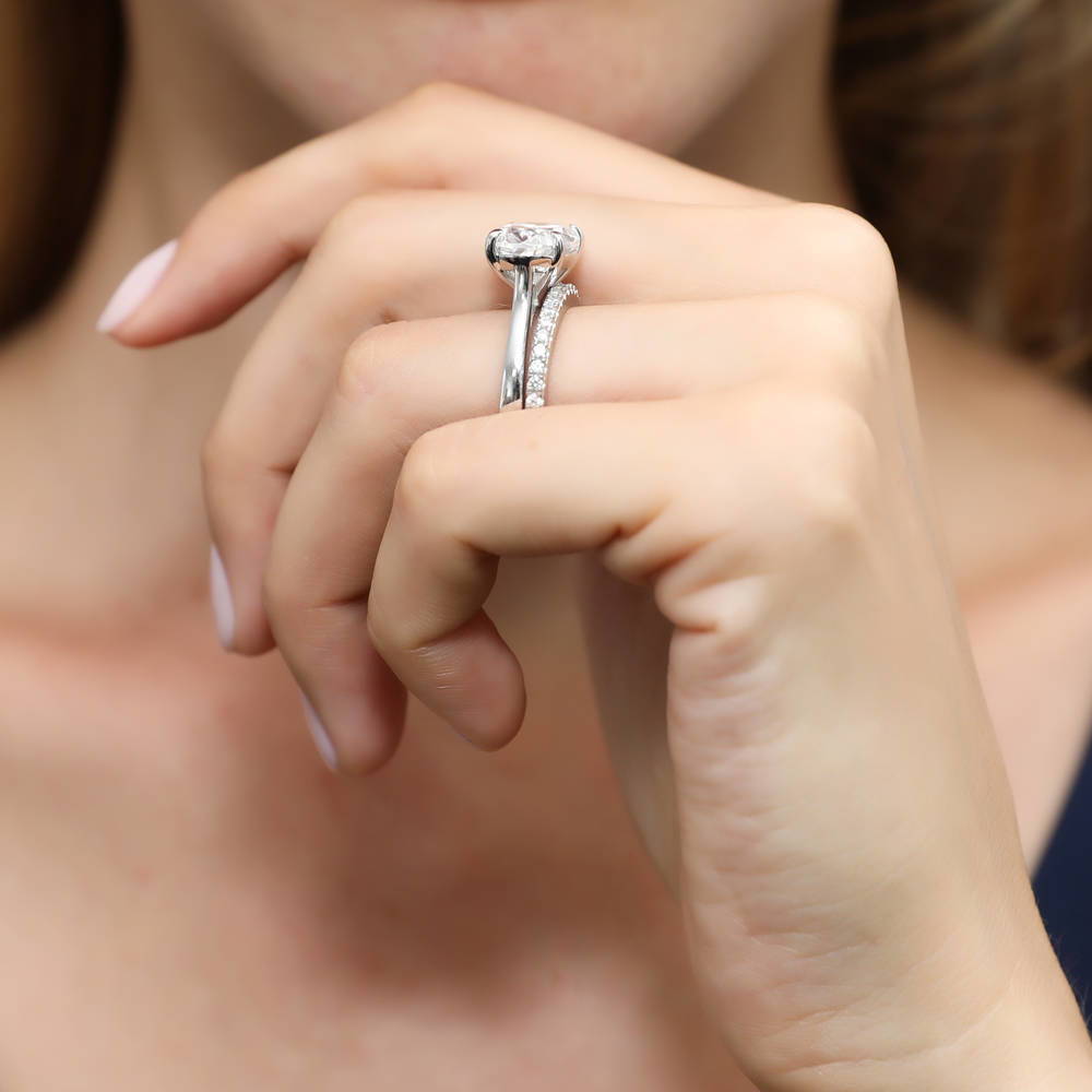 Model wearing East-West Solitaire CZ Ring Set in Sterling Silver, 8 of 13