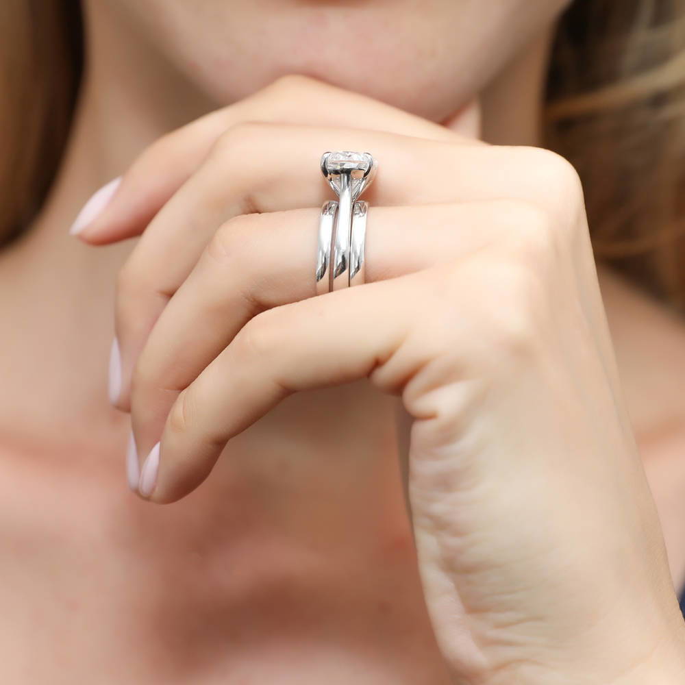 Model wearing East-West Solitaire CZ Ring Set in Sterling Silver, 3 of 11