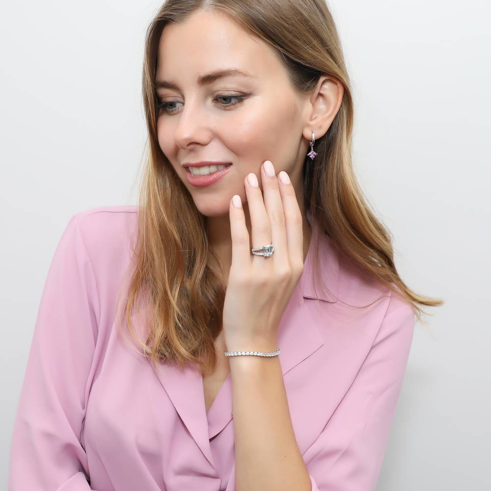 Model wearing Solitaire 2.6ct Emerald Cut CZ Split Shank Ring in Sterling Silver, 7 of 9