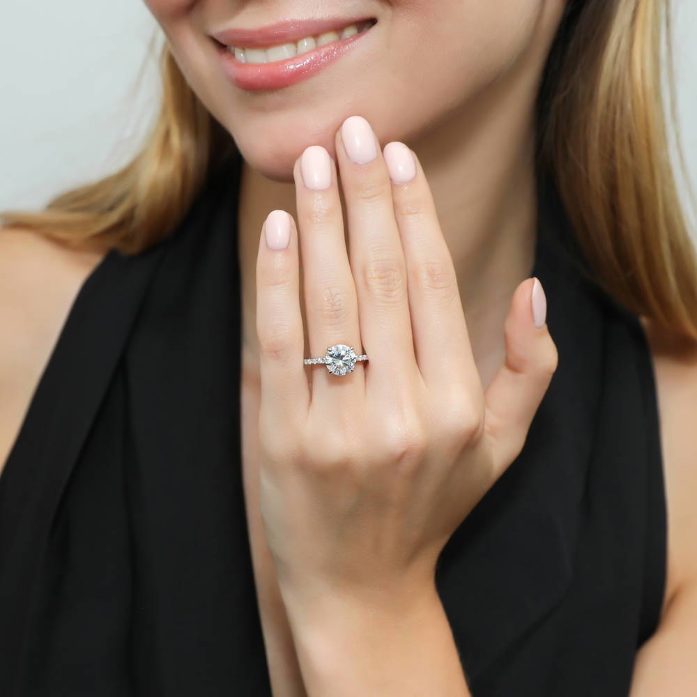 Model wearing Hidden Halo Solitaire CZ Ring Set in Sterling Silver, 6 of 11