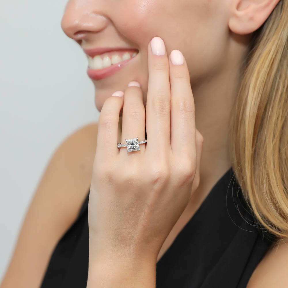 Model wearing Solitaire Hidden Halo 3ct Princess CZ Ring in Sterling Silver, 2 of 8