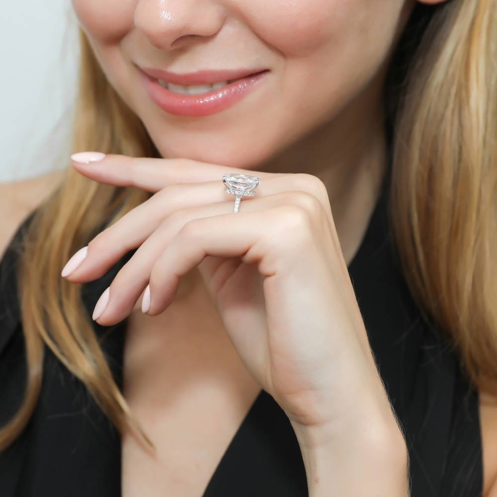 Model wearing Hidden Halo Solitaire CZ Ring Set in Sterling Silver, 9 of 11