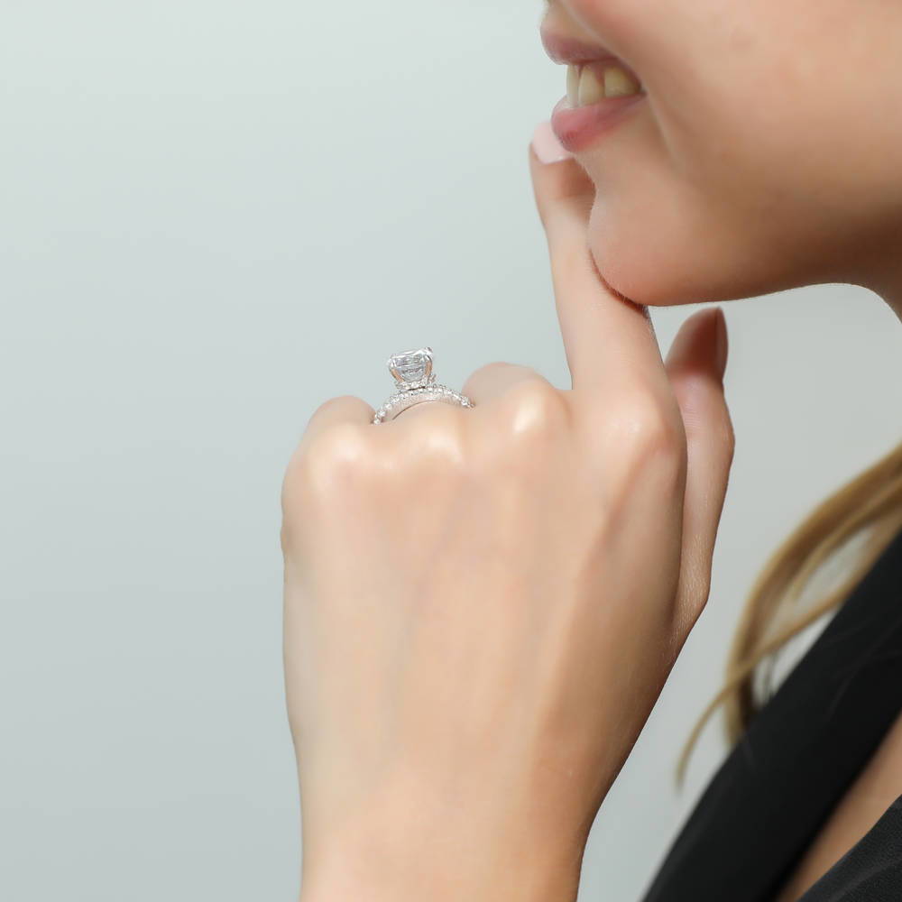 Model wearing Hidden Halo Solitaire CZ Ring Set in Sterling Silver, 5 of 12