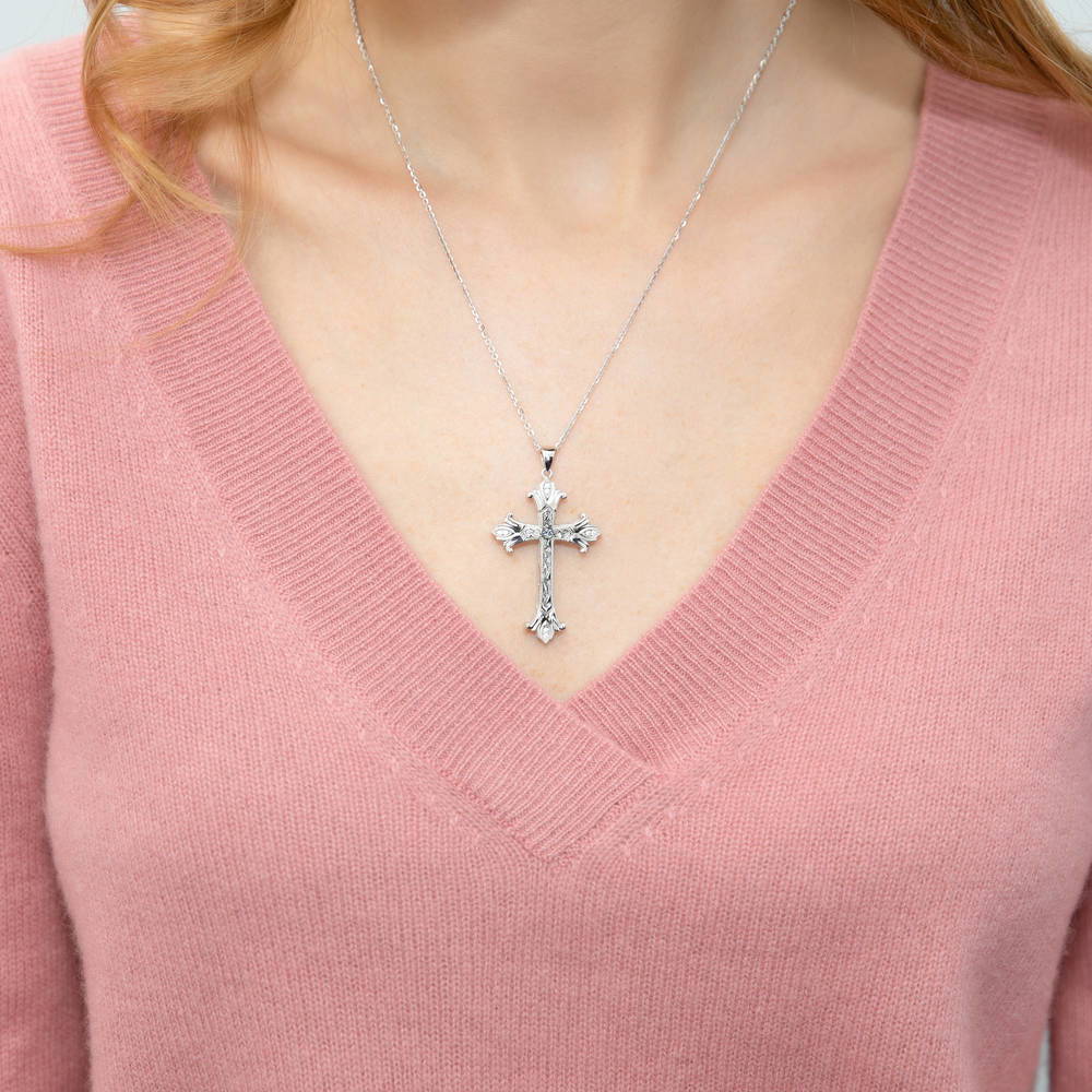 Model wearing Cross Milgrain Filigree CZ Necklace in Sterling Silver, 2 of 5