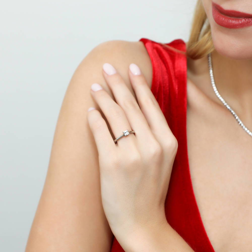 Model wearing Solitaire 0.4ct Princess CZ Ring in Sterling Silver, 2 of 8