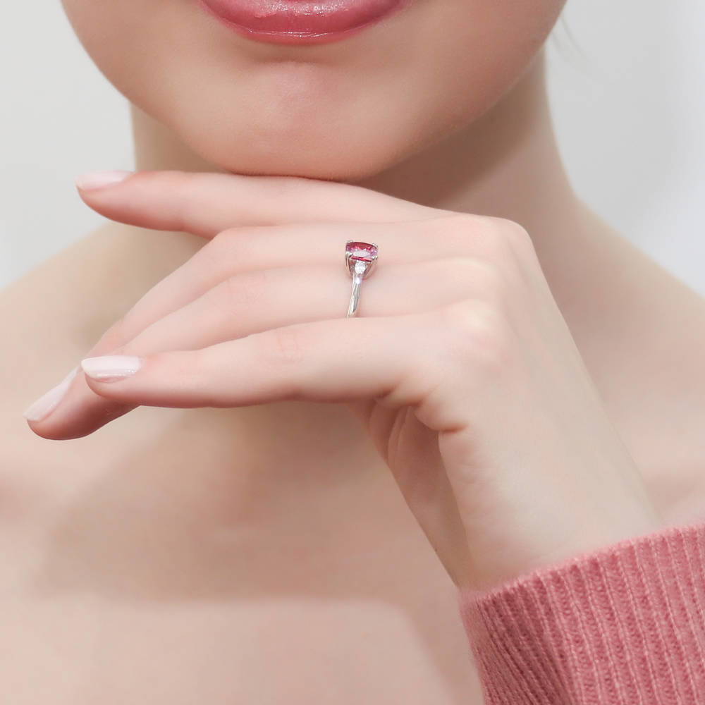 Model wearing 3-Stone Red Cushion CZ Ring in Sterling Silver, 6 of 8