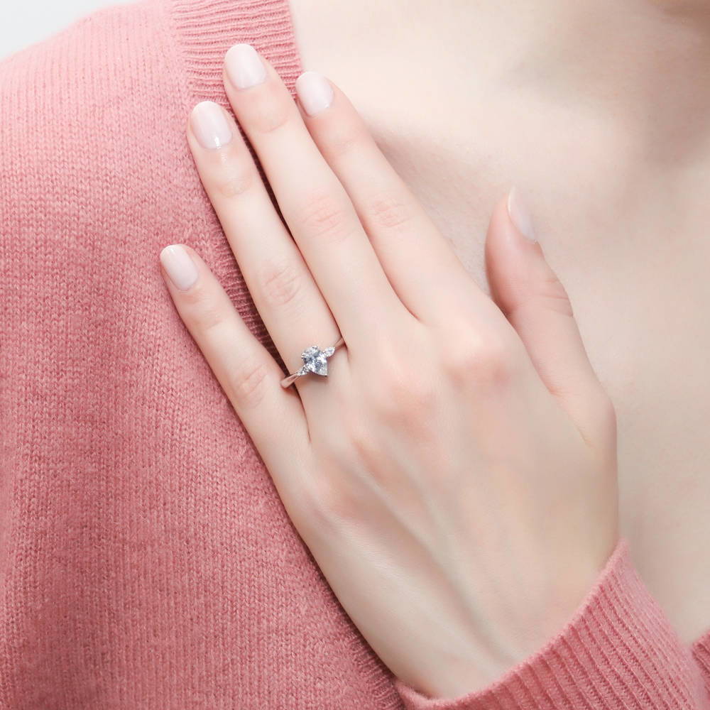 Model wearing 3-Stone Pear CZ Ring in Sterling Silver, 2 of 8