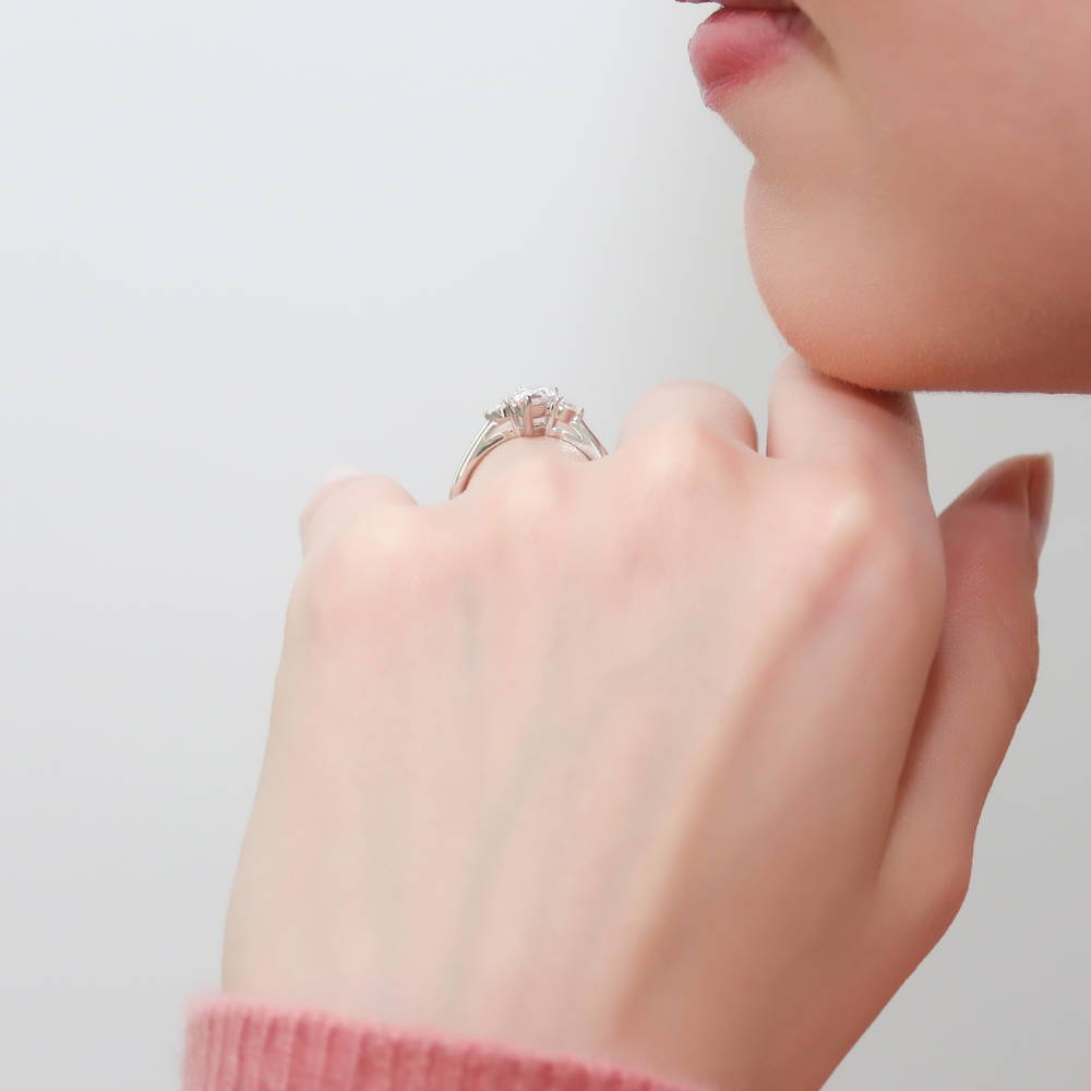Model wearing 3-Stone Pear CZ Ring in Sterling Silver, 3 of 8
