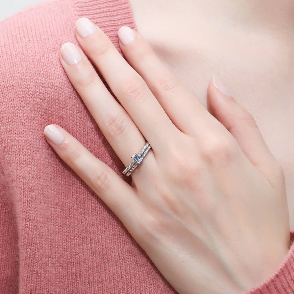 Model wearing Solitaire 0.3ct Emerald Cut CZ Ring in Sterling Silver, 9 of 12