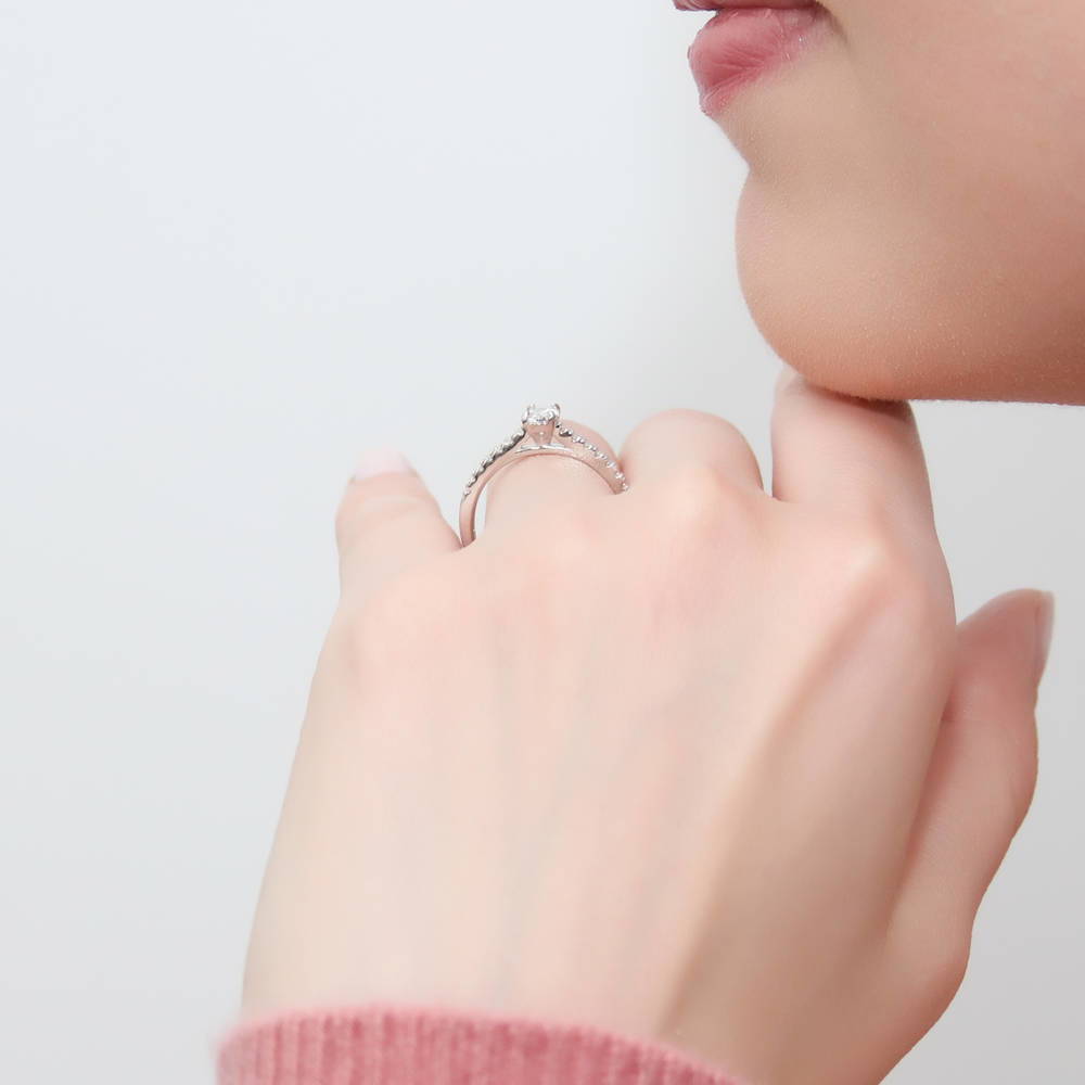 Model wearing Solitaire 0.4ct Oval CZ Ring in Sterling Silver, 3 of 9