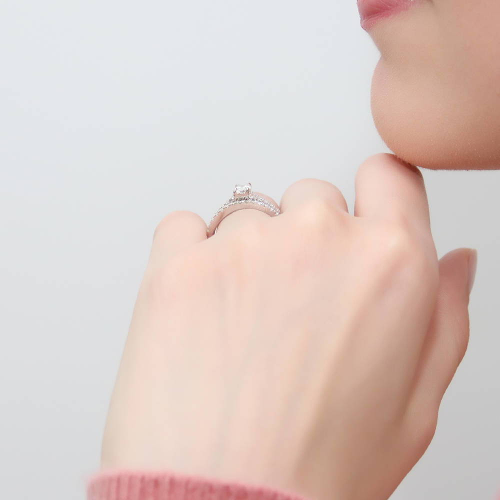 Model wearing Solitaire 0.4ct Oval CZ Ring in Sterling Silver, 10 of 12