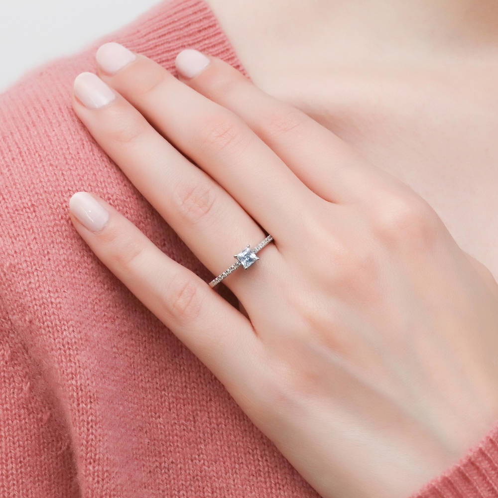 Model wearing Solitaire 0.4ct Princess CZ Ring in Sterling Silver, 2 of 8