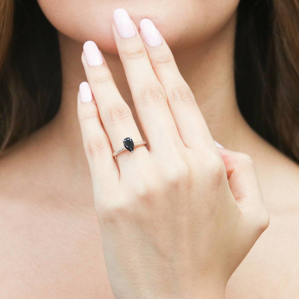 Model wearing Solitaire 0.8ct Black Pear CZ Ring in Sterling Silver, 2 of 9