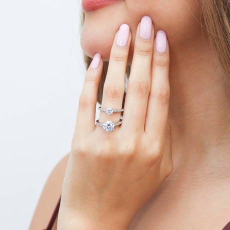 Model Wearing Solitaire with Side Stones Ring