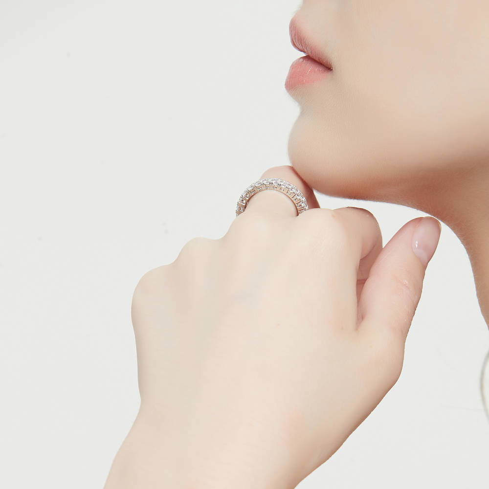 Model wearing Pave CZ Eternity Ring in Sterling Silver, 7 of 9