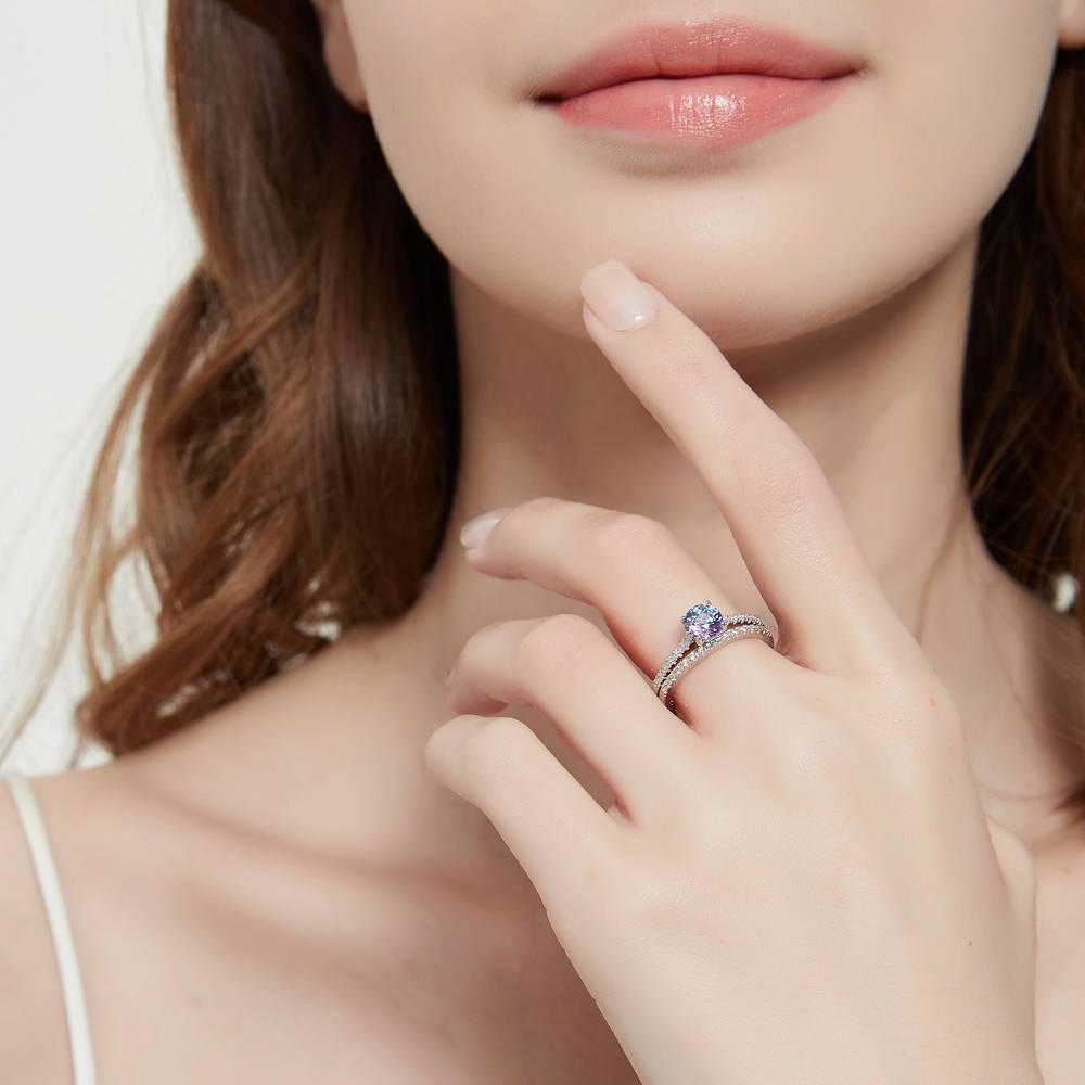 Model wearing Solitaire Kaleidoscope Purple Aqua CZ Ring in Sterling Silver, 8 of 11