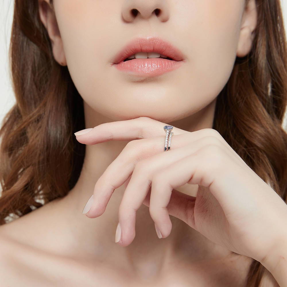 Model wearing Solitaire Kaleidoscope Purple Aqua CZ Ring in Sterling Silver, 9 of 11